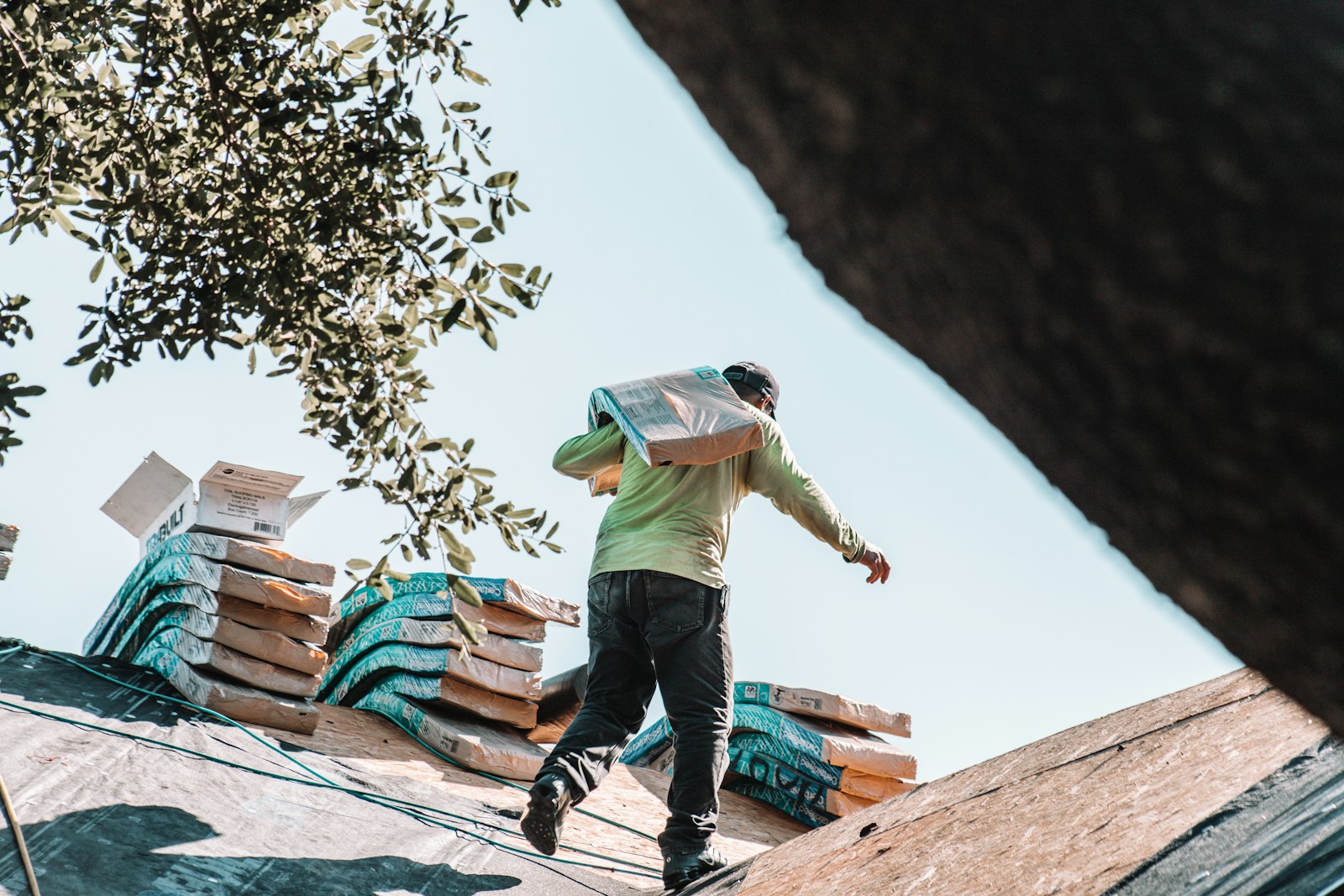 a man riding a skateboard on top of a roof